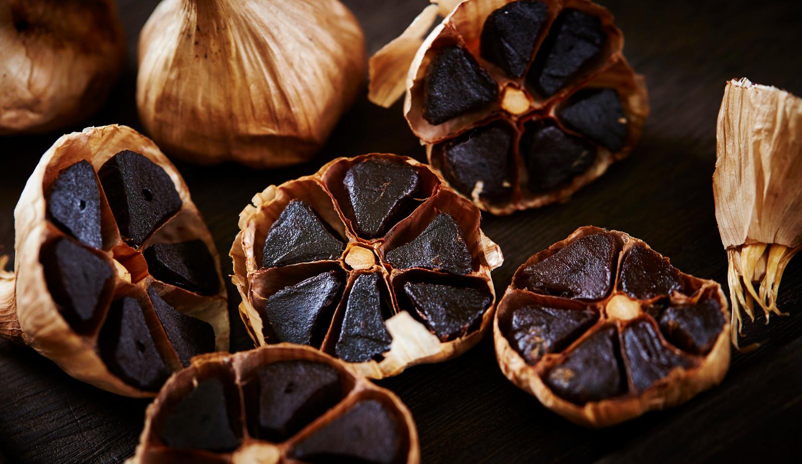 Raw black garlic halfed