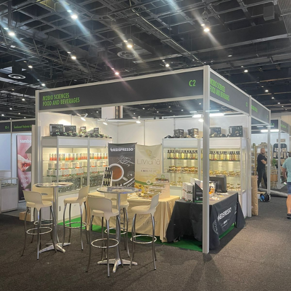 Stand at a show displaying various food products